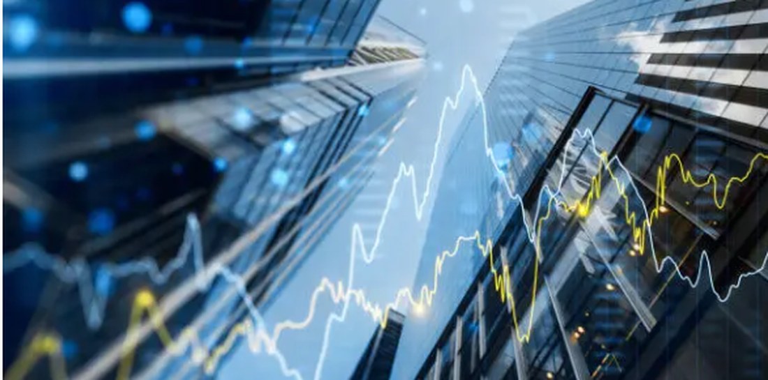 Financial district skyline with market data overlay